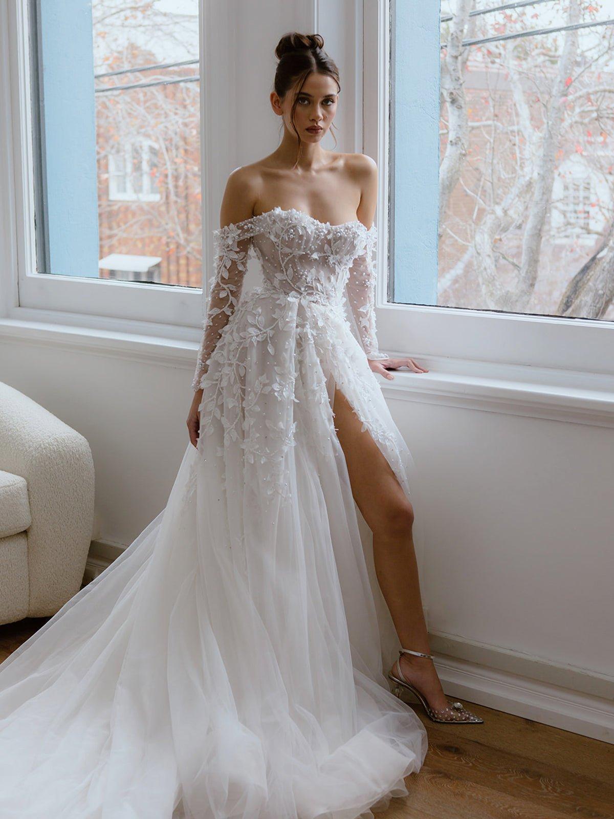 vestido de novia largo con abertura en la pierna ideal como segundo vestido